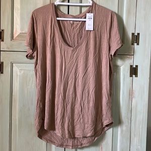 Never worn, with original tags